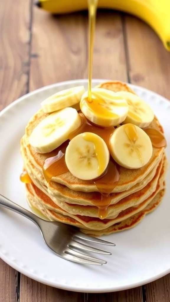 Fluffy banana oat pancakes topped with banana slices and maple syrup on a rustic wooden table.